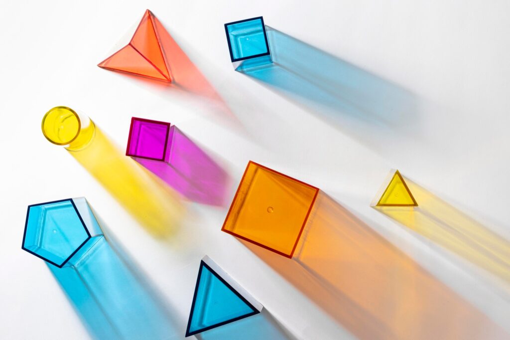 flat-lay-colorful-translucent-geometric-shapes_23-2148830204
