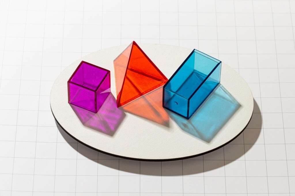 high-angle-colorful-translucent-geometric-shapes_23-2148830201